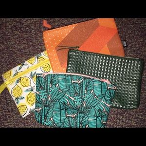 Bundle of small cosmetic bags